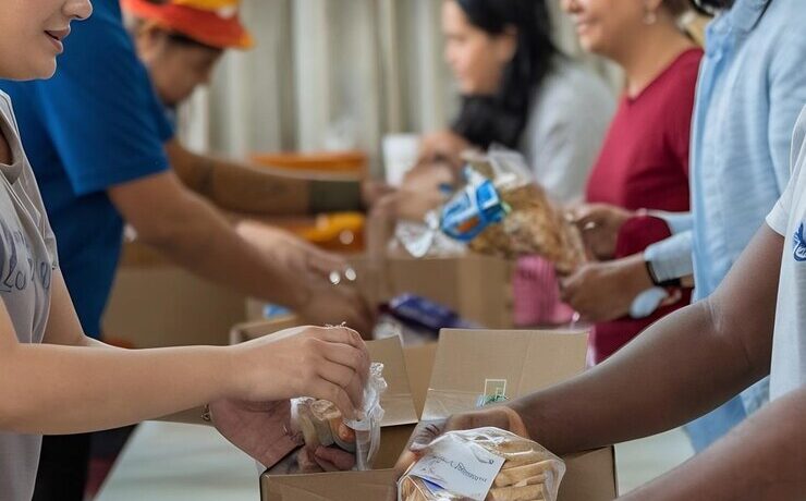 group-volunteers-preparing-free-food-rations-poor-people-need_1313853-217058